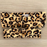 PEACH LEOPARD PRINT TOP KNOT HEADBAND