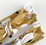 MUSTARD FLORAL TOP KNOT HEADBAND